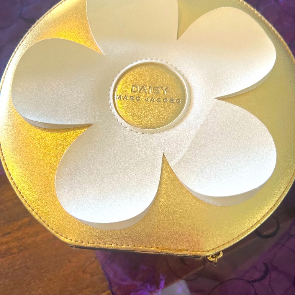 Marc Jacob’s Gold Round Daisy Cosmetic Case